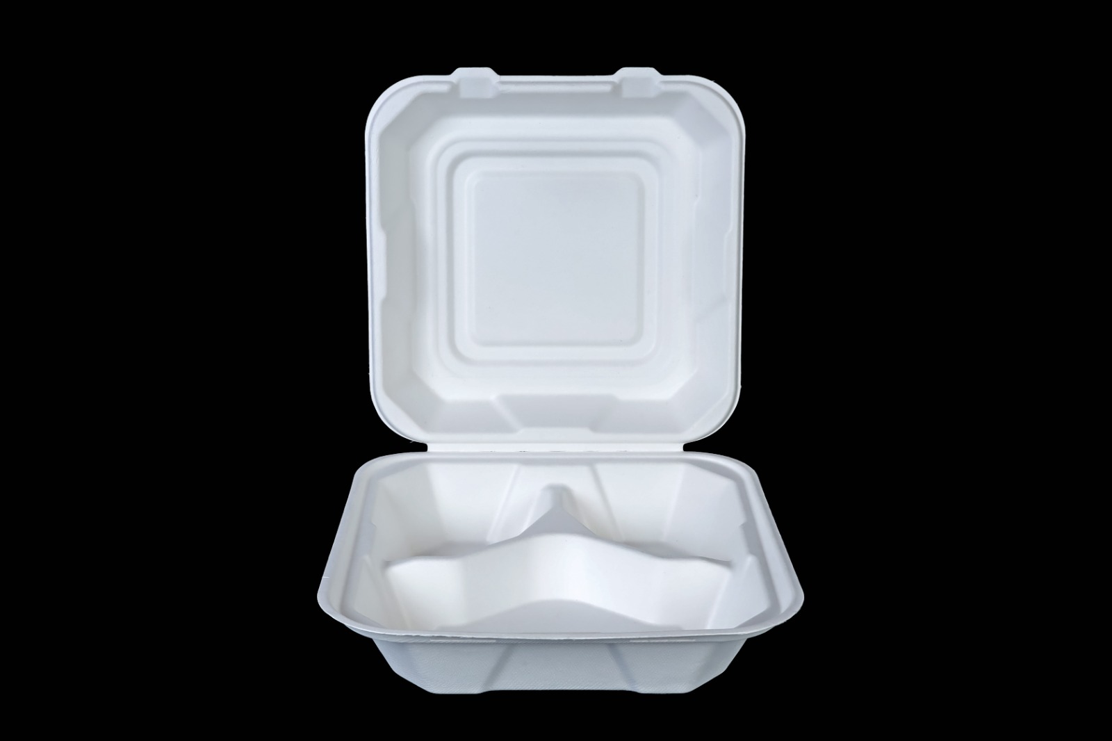 PulpAura Clamshell Containers in natural setting